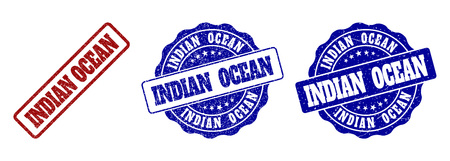 INDIAN OCEAN grunge stamp seals in red and blue colors. Vector INDIAN OCEAN overlays with grunge style. Graphic elements are rounded rectangles, rosettes, circles and text captions.のイラスト素材
