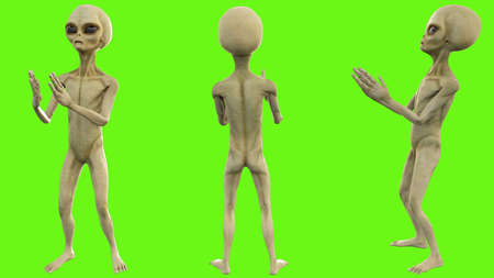Alien clapping on green screenの写真素材