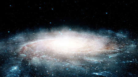 Flight near a rotating spiral galaxy.の写真素材