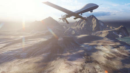 A military drone flies over a deserted plain on a Sunny day.