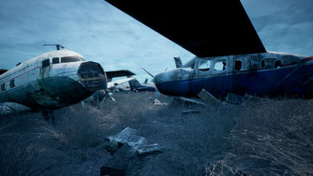 Rusty and broken planes stand in a field against a hazy blue sky. A lot of destroyed, destroyed, abandoned planes. 3D Renderingの写真素材