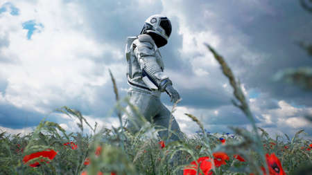An astronaut-Explorer is walking on a blooming planet. 3D Rendering.の写真素材