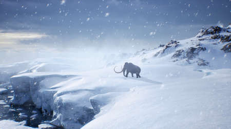 A huge mammoth is walking along a snow-covered glacier. Huge high glaciers in winter natural conditions. Arctic winter landscape. The concept of ancient extinct animals.の写真素材