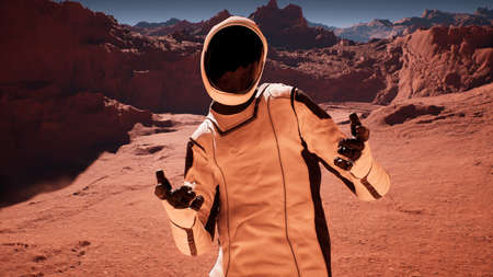 Happy astronaut explorer on the red planet Mars point hand gesture. Astronaut Martian colonizes and...