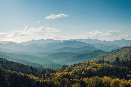 Beautiful ancient mountains on a sunny clear day. Mountains and hills in the sunlight and in the mist. 3D rendering.の写真素材