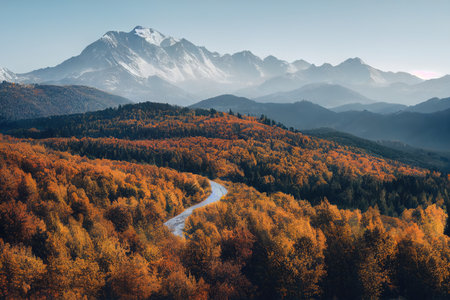 Beautiful ancient mountains on a sunny clear day. Mountains and hills in the sunlight and in the mist. 3D rendering.の素材