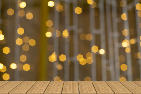 Empty table in front of blurry Hexagon light bokeh background.の写真素材