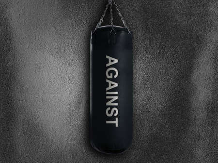 boxing punch bag on black background の写真素材