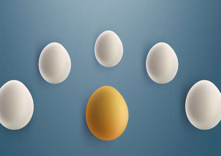 unique golden egg between white eggs on blue background.の写真素材