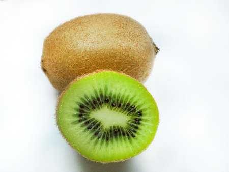 Fresh green kiwi isolated on a white background の写真素材