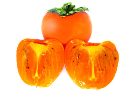 Ripe persimmons isolated on white background .の写真素材
