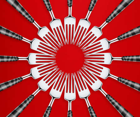 Empty copy space of Set of forks in competition on red  background.の写真素材