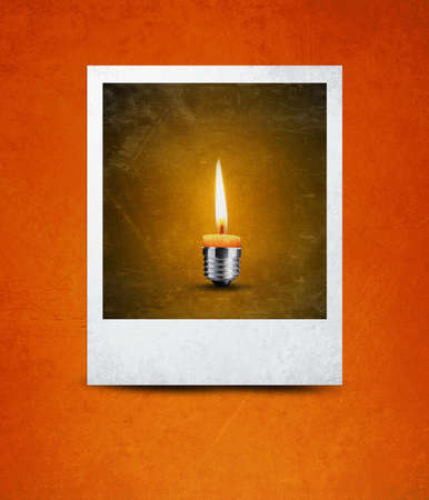 wax candle into lighting bulb in photograph, light bulb conceptual Image.の写真素材