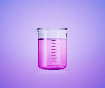liquid in laboratory test tubes  on blue backgroundの写真素材