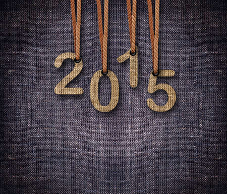 2013 numbers hunging by rope as puppeteer on sackcloth background.の写真素材