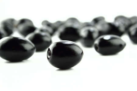 Black Olives on a white backgroundの写真素材