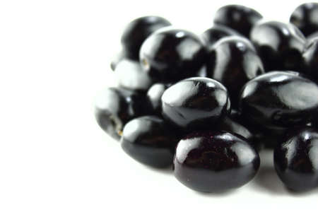 Black Olives on a white backgroundの写真素材