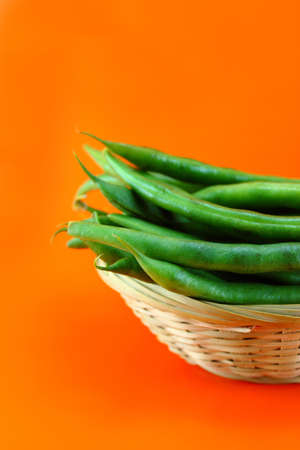 fresh beans fruit on orange background .の写真素材