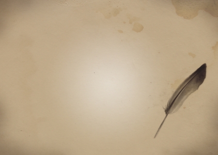 old paper with featherの写真素材