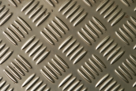 Background of metal diamond plate in silver color  の写真素材