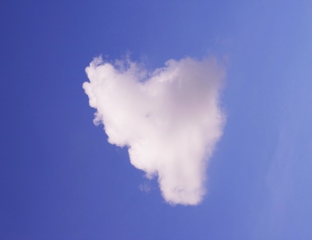 heart shaped cloud on blue skyの写真素材