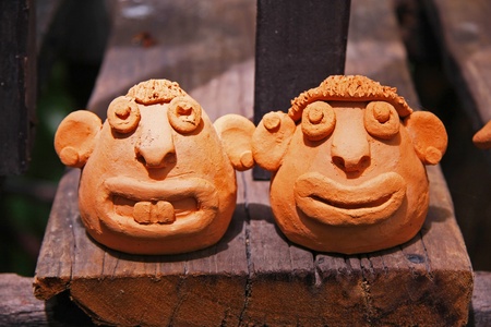 smile baked clay dolls  ornamental in the gardenの写真素材