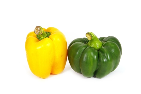 yellow and green sweet pepper isolated on white background の写真素材