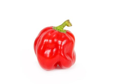 red sweet pepper isolated on white background の写真素材