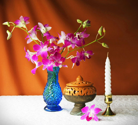 earthen bowl,vase,orchid, ash tray with pedestal and candle の写真素材