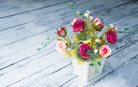 Still life with a beautiful classical bouquet of roses in retro filter effect の写真素材