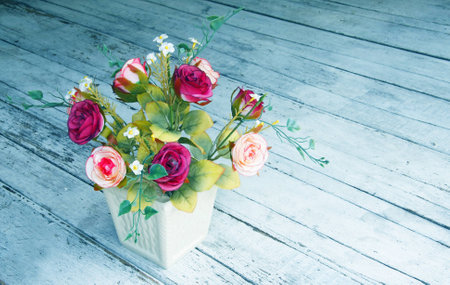 Still life with a beautiful classical bouquet of roses in retro filter effect の写真素材