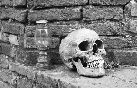 still life with vintage retro alarm clock on old brick background (black and white concept )の写真素材