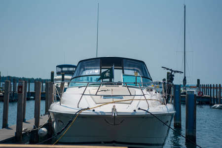 Mackinaw Island, MI - July 14, 2021: Small boated moored at Mackinaw Island on MI on July 14, 2021.のeditorial素材