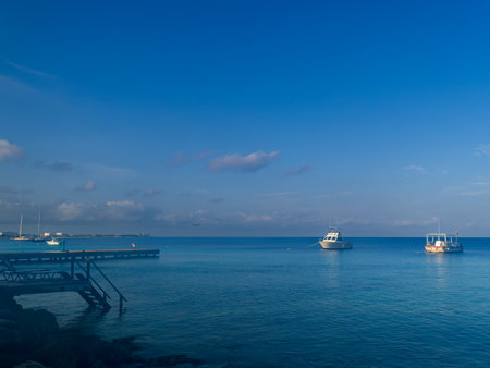 BONAIRE - OCTOBER 6, 2013: Resort dive boats anchored in bayのeditorial素材