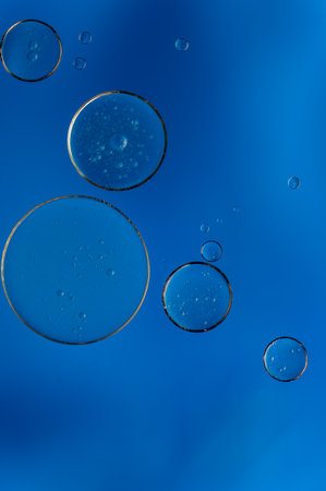 Abstract colorful bubbles. Soft background with blue tones and circles.