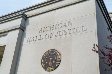 Lansing MI - May 6, 2023: State of Michigan seal on the Michigan Hall of Justice Buildingのeditorial素材