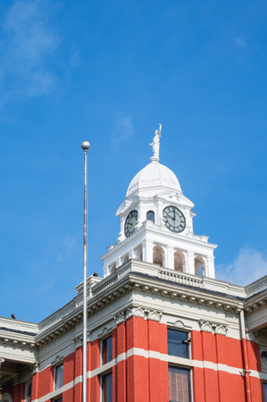 Charlotte MI - April 27, 2024:Historic Courthouse Clock Tower Against Blue Sky with Copy-Spaceのeditorial素材