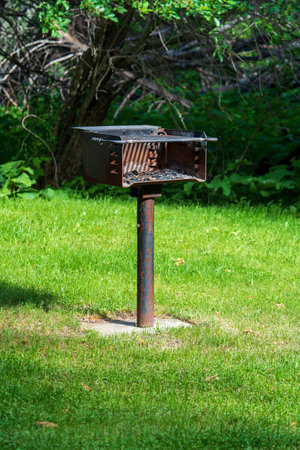 Public Barbecue or BBQ Grill in a public park on a sunny dayの写真素材