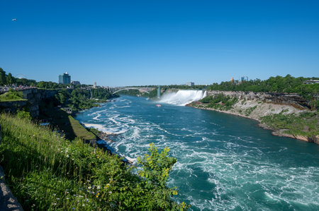 Niagara Falls, Canada - June 15, 2024: Niagara Falls and River Panorama with Copy-Spaceのeditorial素材
