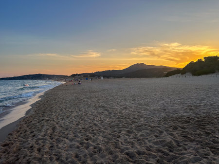 Sunset on the beach in Chia Cagliari Italyの写真素材