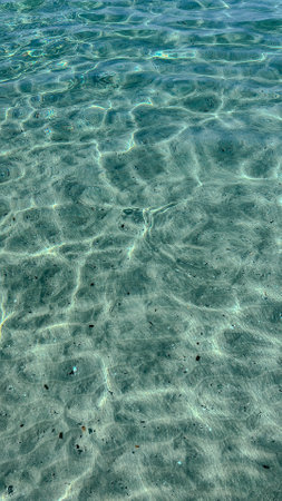 abstract background of the turquoise water of the Mediterranean Seaの写真素材