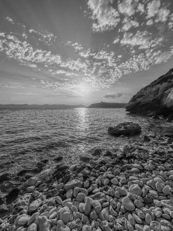 Beautiful seascape. Sunset over the sea. Black and white photo.の写真素材