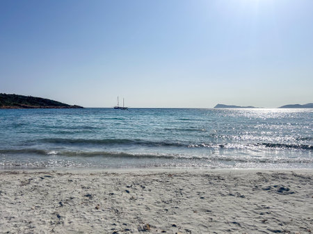 Sailing boat on the seashore. Sunny summer day.の写真素材