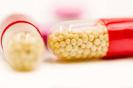 colorful medicine pills on the white backgroundの写真素材