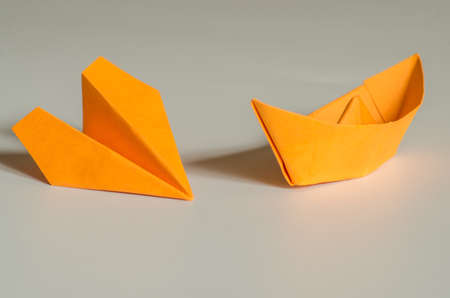 origami art ship and plane on whiteの写真素材