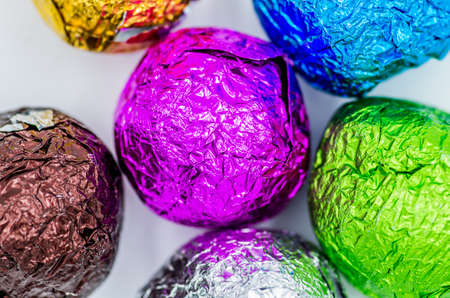 colorful gift balls with candies or tea white backgroundの写真素材