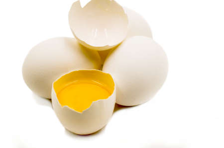 fresh eggs with yellow yalk on the black backgroundの写真素材