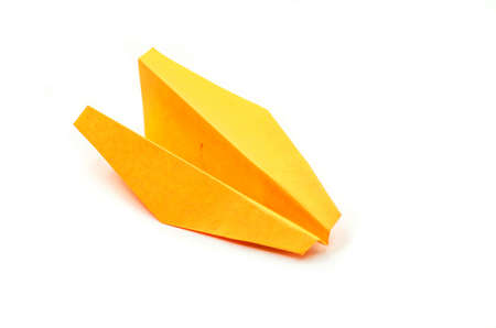 blunt origami paper plane on white backgroundの写真素材
