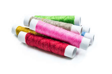 sewing tools and pins on the white background
