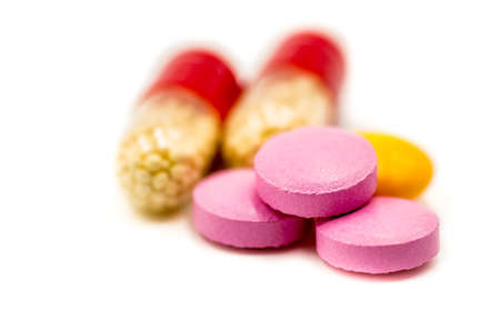 colorful medicine pills on the white background